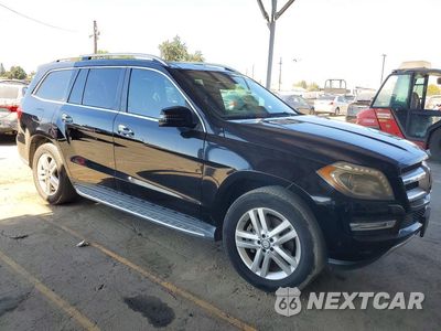 Czwarte zdjęcie samochodu z boku: 2014 MERCEDES-BENZ GL 350 BLUETEC VIN:4JGDF2EE2EA297687 - miniatura