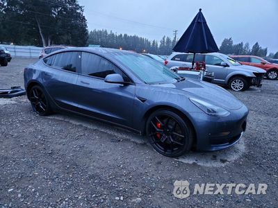 Czwarte zdjęcie samochodu z boku: 2023 TESLA MODEL 3 VIN:5YJ3E1EC2PF670491 - miniatura