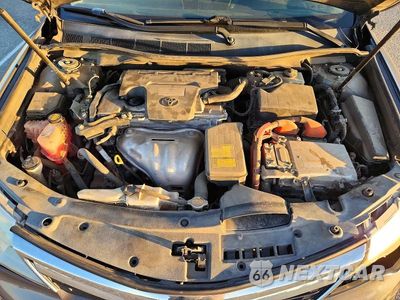 Zdjęcie 11 z 12 samochodu: 2012 TOYOTA CAMRY HYBRID LE VIN:4T1BD1FK1CU062480 - miniatura