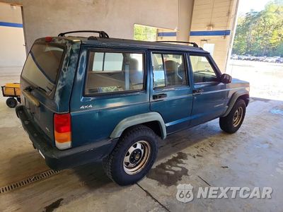 Trzecie zdjęcie samochodu z tyłu: 1997 JEEP CHEROKEE SE VIN:1J4FJ28S4VL544557 - miniatura
