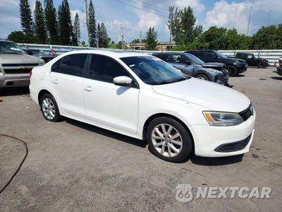 Czwarte zdjęcie samochodu z boku: 2012 VOLKSWAGEN JETTA SE VIN:3VWDX7AJ9CM344633 - miniatura