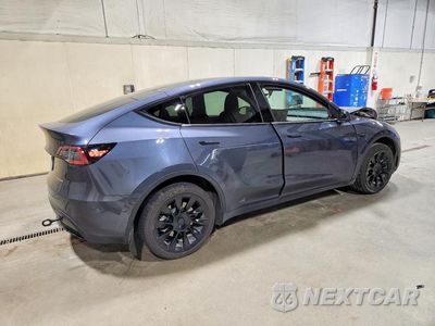 Trzecie zdjęcie samochodu z tyłu: 2022 TESLA MODEL Y VIN:7SAYGDEE3NF512101 - miniatura