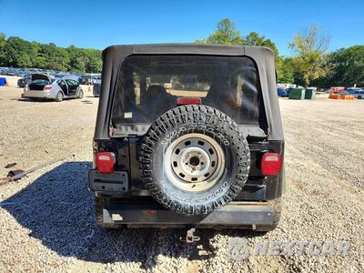 Zdjęcie 6 z 12 samochodu: 1998 JEEP WRANGLER / TJ SPORT VIN:1J4FY19S1WP705624 - miniatura