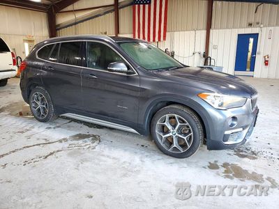 Czwarte zdjęcie samochodu z boku: 2016 BMW X1 XDRIVE28I VIN:WBXHT3C31G5F64390 - miniatura