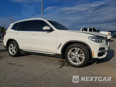 Czwarte zdjęcie samochodu z boku: 2021 BMW X3 SDRIVE30I VIN:5UXTY3C00M9E20301 - miniatura