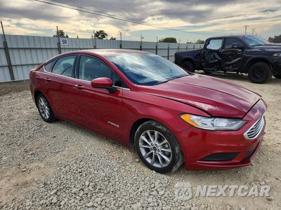 Czwarte zdjęcie samochodu z boku: 2017 FORD FUSION SE HYBRID VIN:3FA6P0LU7HR385689 - miniatura