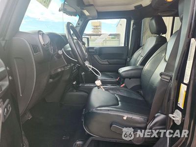 Zdjęcie 7 z 13 samochodu: 2013 JEEP WRANGLER UNLIMITED SAHARA VIN:1C4HJWEG5DL580603 - miniatura