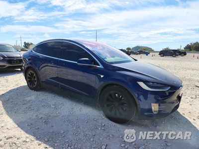Czwarte zdjęcie samochodu z boku: 2017 TESLA MODEL X VIN:5YJXCBE23HF049959 - miniatura