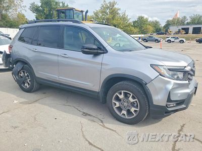 Czwarte zdjęcie samochodu z boku: 2022 HONDA PASSPORT TRAIL SPORT VIN:5FNYF8H68NB026881 - miniatura