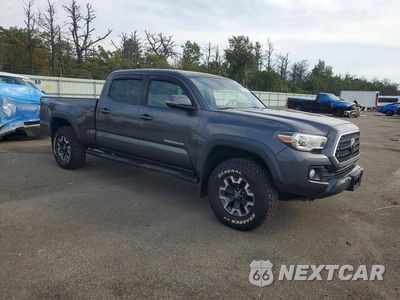 Czwarte zdjęcie samochodu z boku: 2019 TOYOTA TACOMA TRD OFF-ROAD VIN:3TMDZ5BN1KM068031 - miniatura