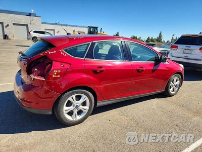 Trzecie zdjęcie samochodu z tyłu: 2014 FORD FOCUS SE VIN:1FADP3K25EL185476 - miniatura