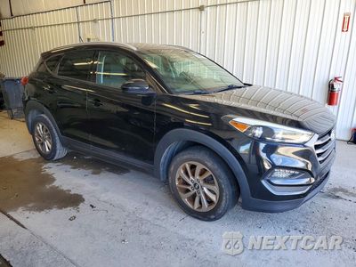 Czwarte zdjęcie samochodu z boku: 2016 HYUNDAI TUCSON SE VIN:KM8J3CA45GU100303 - miniatura