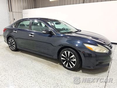 Czwarte zdjęcie samochodu z boku: 2018 NISSAN ALTIMA 2.5 SL VIN:1N4AL3AP7JC154624 - miniatura