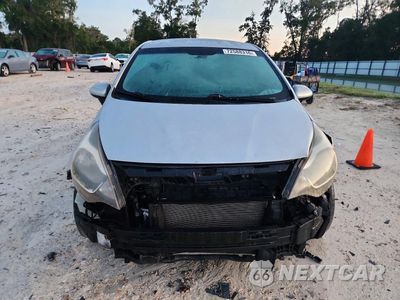 Piąte zdjęcie samochodu w środku: 2014 KIA RIO LX VIN:KNADM4A39E6341274 - miniatura