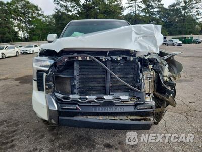 Piąte zdjęcie samochodu w środku: 2023 TOYOTA TUNDRA PLATINUM VIN:5TFNA5DBXPX109076 - miniatura