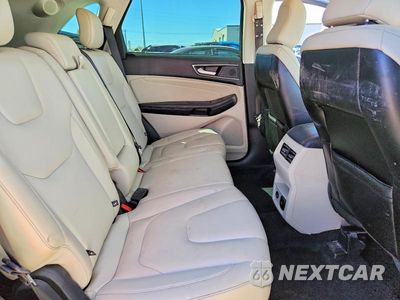 Zdjęcie 11 z 14 samochodu: 2022 FORD EDGE TITANIUM VIN:2FMPK4K9XNBA00603 - miniatura