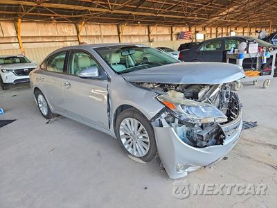 Czwarte zdjęcie samochodu z boku: 2014 TOYOTA AVALON HYBRID XLE TOURING VIN:4T1BD1EB9EU030557 - miniatura