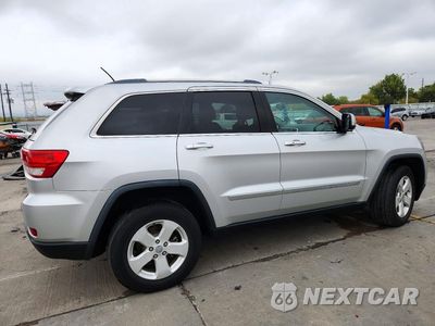 Trzecie zdjęcie samochodu z tyłu: 2012 JEEP GRAND CHEROKEE LAREDO VIN:1C4RJFAG7CC249515 - miniatura