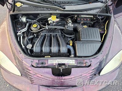 Zdjęcie 11 z 12 samochodu: 2004 CHRYSLER PT CRUISER VIN:3C4FY48B64T218453 - miniatura