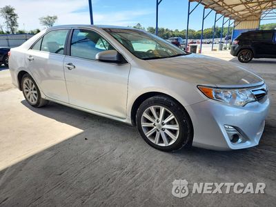 Czwarte zdjęcie samochodu z boku: 2014 TOYOTA CAMRY XLE VIN:4T4BF1FK3ER419340 - miniatura