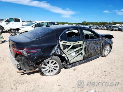 Trzecie zdjęcie samochodu z tyłu: 2024 TOYOTA CAMRY LE VIN:4T1C11AK6RU863631 - miniatura