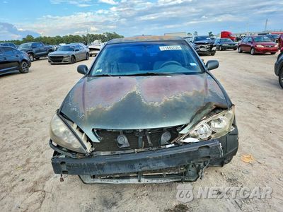 Piąte zdjęcie samochodu w środku: 2005 TOYOTA CAMRY LE VIN:4T1BE32K95U072434 - miniatura