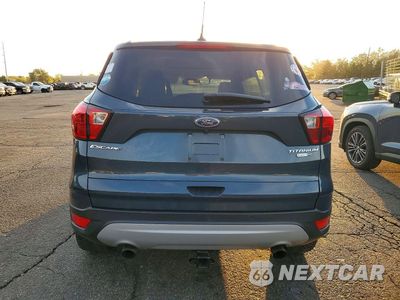Zdjęcie 6 z 12 samochodu: 2019 FORD ESCAPE TITANIUM VIN:1FMCU9J95KUC53731 - miniatura
