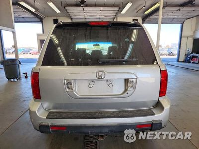 Zdjęcie 6 z 14 samochodu: 2007 HONDA PILOT EX VIN:2HKYF18427H532510 - miniatura