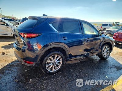 Trzecie zdjęcie samochodu z tyłu: 2021 MAZDA CX-5 GRAND TOURING VIN:JM3KFADM6M0400538 - miniatura