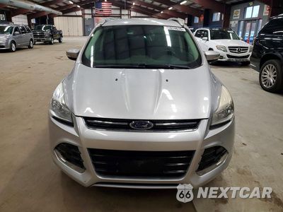 Piąte zdjęcie samochodu w środku: 2016 FORD ESCAPE TITANIUM VIN:1FMCU9JX9GUB42671 - miniatura