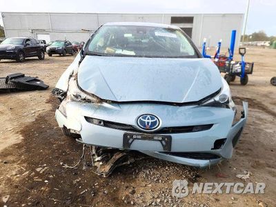 Piąte zdjęcie samochodu w środku: 2018 TOYOTA PRIUS TWO VIN:JTDKBRFU2J3589330 - miniatura