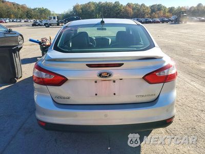 Zdjęcie 6 z 12 samochodu: 2014 FORD FOCUS TITANIUM VIN:1FADP3J24EL346854 - miniatura