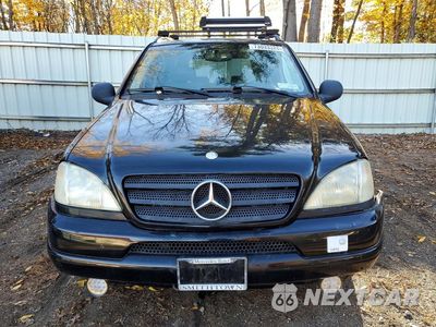 Piąte zdjęcie samochodu w środku: 1999 MERCEDES-BENZ ML 430 VIN:4JGAB72E0XA121787 - miniatura