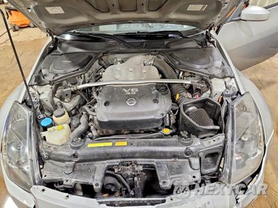 Zdjęcie 11 z 12 samochodu: 2004 NISSAN 350Z BASE VIN:JN1AZ34D04M103431 - miniatura