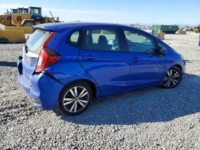Trzecie zdjęcie samochodu z tyłu: 2018 HONDA FIT EX VIN:3HGGK5H80JM731513 - miniatura