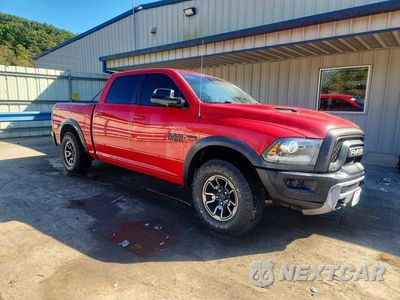 Czwarte zdjęcie samochodu z boku: 2016 RAM 1500 REBEL VIN:1C6RR7YT2GS215504 - miniatura