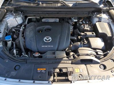 Zdjęcie 12 z 13 samochodu: 2021 MAZDA CX-5 GRAND TOURING VIN:JM3KFADM4M1344755 - miniatura