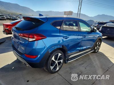 Trzecie zdjęcie samochodu z tyłu: 2018 HYUNDAI TUCSON SPORT VIN:KM8J3CAL6JU829862 - miniatura