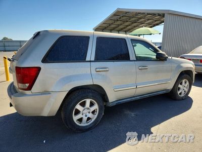 Trzecie zdjęcie samochodu z tyłu: 2010 JEEP GRAND CHEROKEE LAREDO VIN:1J4PR4GK4AC160234 - miniatura