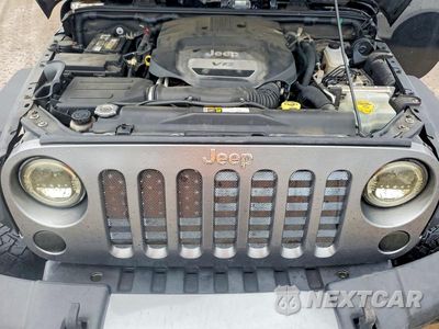 Zdjęcie 12 z 13 samochodu: 2015 JEEP WRANGLER UNLIMITED SPORT VIN:1C4BJWDG6FL637935 - miniatura