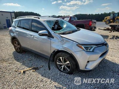 Czwarte zdjęcie samochodu z boku: 2018 TOYOTA RAV4 XLE VIN:JTMWFREV7JJ202119 - miniatura