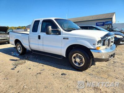 Czwarte zdjęcie samochodu z boku: 1999 FORD F250 SUPER DUTY VIN:1FTNX20S9XEB68862 - miniatura