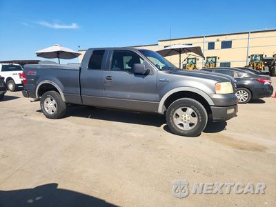 Czwarte zdjęcie samochodu z boku: 2005 FORD F150 VIN:1FTPX14575NB24931 - miniatura