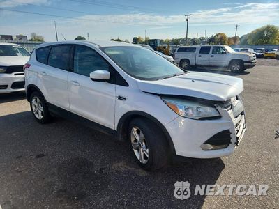 Czwarte zdjęcie samochodu z boku: 2014 FORD ESCAPE SE VIN:1FMCU0GX9EUE28214 - miniatura