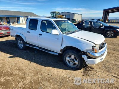 Czwarte zdjęcie samochodu z boku: 2000 NISSAN FRONTIER XE VIN:1N6ED27Y0YC309265 - miniatura
