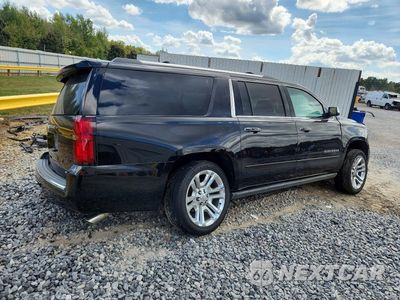 Trzecie zdjęcie samochodu z tyłu: 2019 CHEVROLET SUBURBAN C1500 PREMIER VIN:1GNSCJKJXKR337650 - miniatura