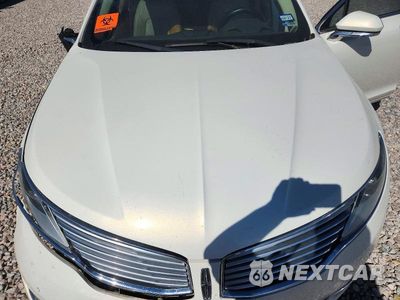 Zdjęcie 11 z 12 samochodu: 2013 LINCOLN MKZ HYBRID VIN:3LN6L2LU2DR815054 - miniatura