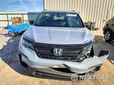 Piąte zdjęcie samochodu w środku: 2022 HONDA PILOT TRAILSPORT VIN:5FNYF6H83NB048633 - miniatura