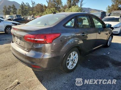 Trzecie zdjęcie samochodu z tyłu: 2015 FORD FOCUS SE VIN:1FADP3F22FL229896 - miniatura