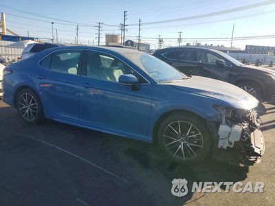 Czwarte zdjęcie samochodu z boku: 2023 TOYOTA CAMRY HYBRID SE VIN:4T1G31AK2PU049727 - miniatura